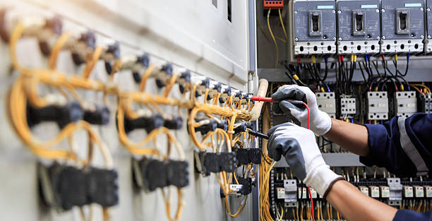 Professional Electrician technician working in Freer, TX